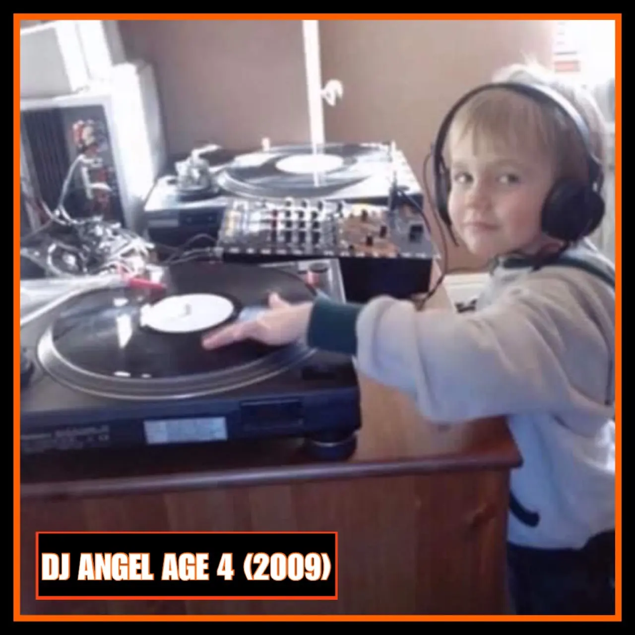 GS aged 4, wearing headphones at the decks in 2009
