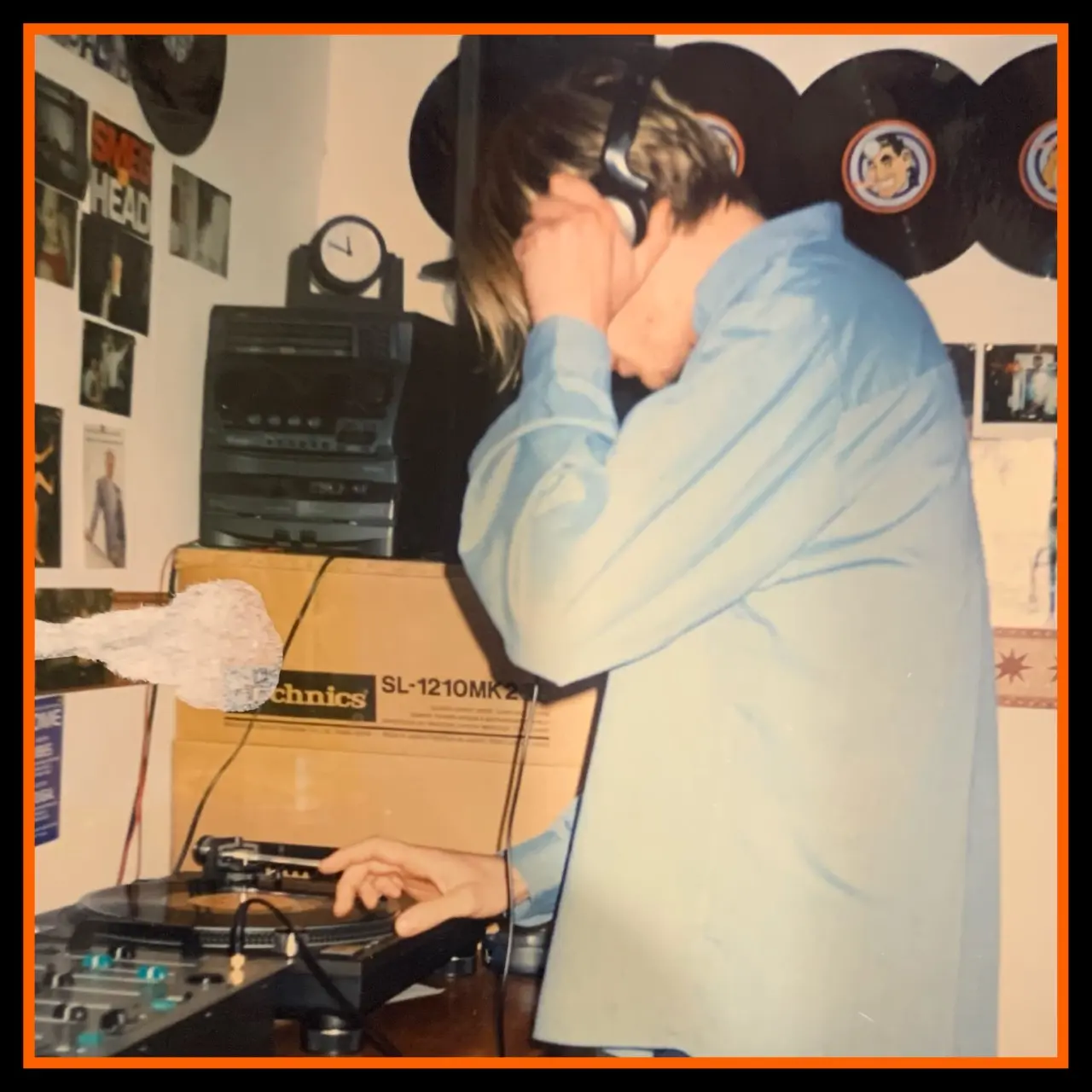 Teenage DJ HH practising on Technics SL-1210 turntables